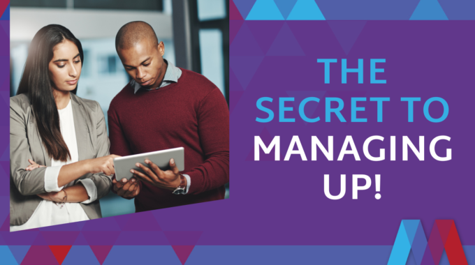 Professional Woman And Man Working Together Looking At A Tablet In A Modern Office Environment, With Purple And Blue Geometric Design Elements And Text "The Secret To Managing Up!"