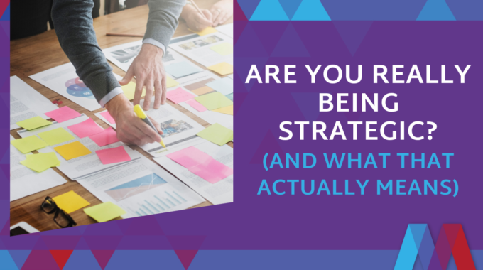 Strategic Leadership Blog Featured Image Showing Hands Organizing Colorful Sticky Notes And Documents On Planning Board, With Purple Text Overlay Reading 'Are You Really Being Strategic? (And What That Actually Means)'