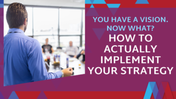 Leader presenting strategic implementation plan to a team in a boardroom — Mosaic People Development leadership coaching