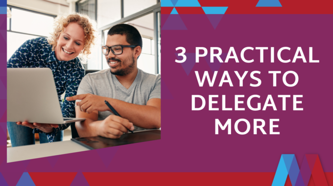 Feature Image Titled "3 Practical Ways To Delegate More" Showing A Leader Pointing At A Laptop Screen While Coaching A Team Member.