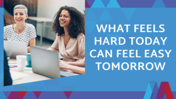 Two smiling businesswomen sitting at a table with laptops and coffee mugs, with text reading 'What Feels Hard Today Can Feel Easy Tomorrow' on a blue background with Mosaic People Development's geometric triangle design.