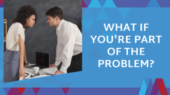 A man and woman lean over a desk facing each other in a tense conversation, with the text "What if you're part of the problem?" beside them on a blue and burgundy geometric background.